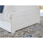 Letto a piattaforma con pediera e 2 cassetti portaoggetti