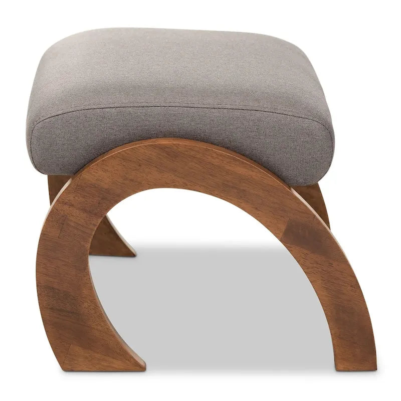 Pouf contemporaneo rivestito in tessuto con gambe ad arco